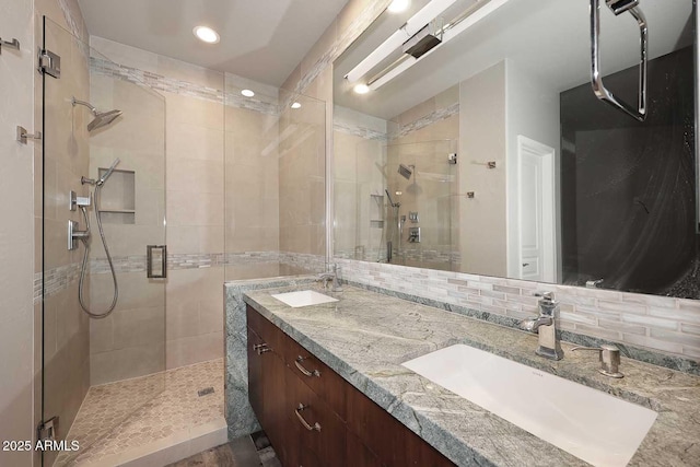 8180 E Shea Blvd Unit 1075, Scottsdale, AZ 85260 - full bathroom featuring a stall shower, double vanity, and recessed lighting