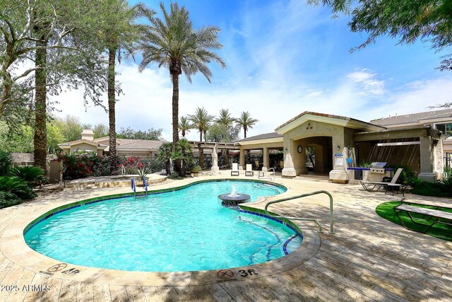 8180 E Shea Blvd Unit 1075, Scottsdale, AZ 85260 - community pool featuring a patio area and area for grilling
