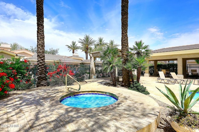 8180 E Shea Blvd Unit 1075, Scottsdale, AZ 85260 - view of swimming pool featuring a community hot tub and a patio area