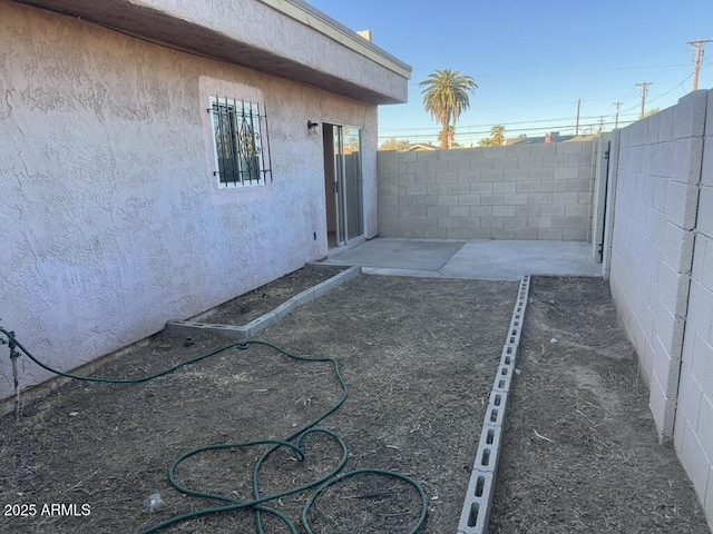 view of yard with a patio area