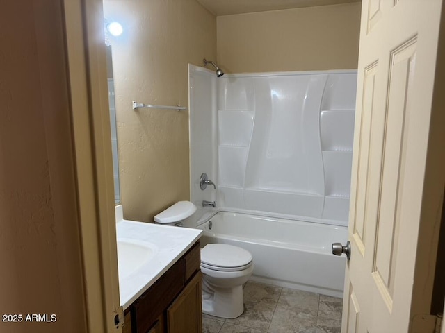 full bathroom featuring toilet, vanity, and shower / bath combination