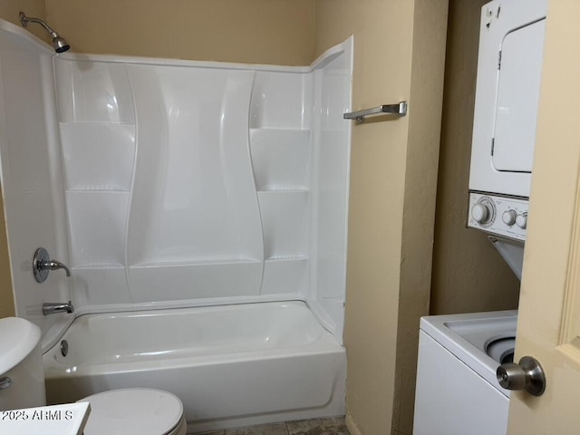 bathroom with toilet and bathtub / shower combination