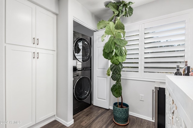 clothes washing area featuring dark hardwood / wood-style floors, wine cooler, and stacked washer and clothes dryer