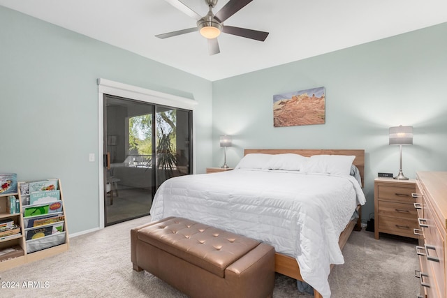 bedroom featuring access to exterior, ceiling fan, and light carpet