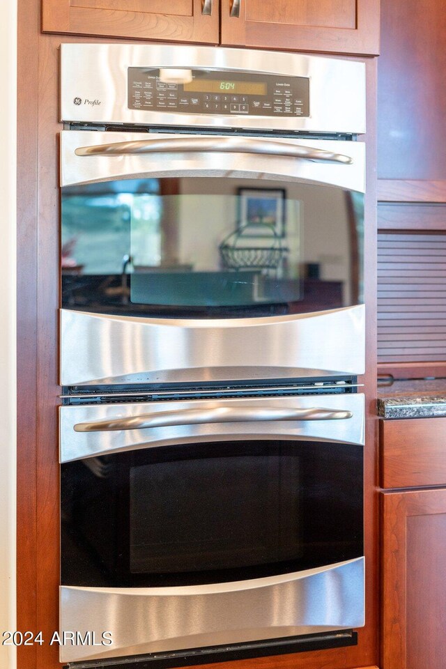 interior details featuring stainless steel double oven