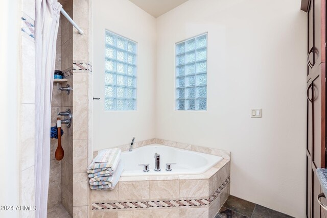 bathroom with independent shower and bath