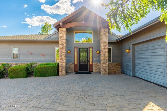 entrance to property with a garage