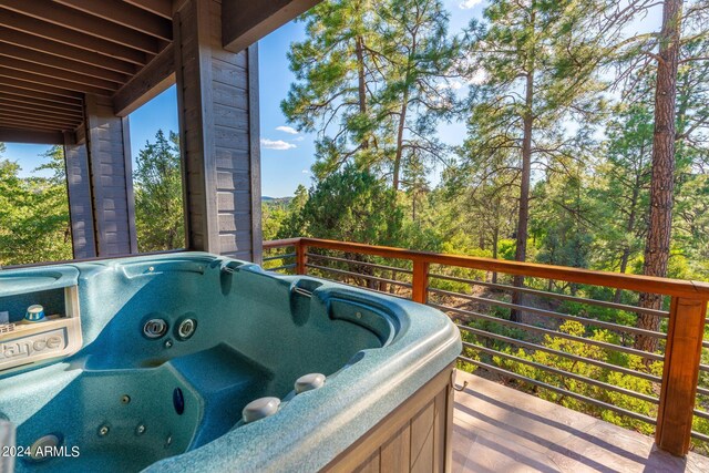 exterior space featuring a hot tub