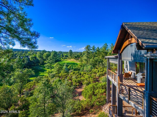 view of yard featuring a wooden deck