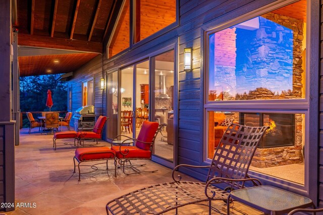 view of patio terrace at dusk