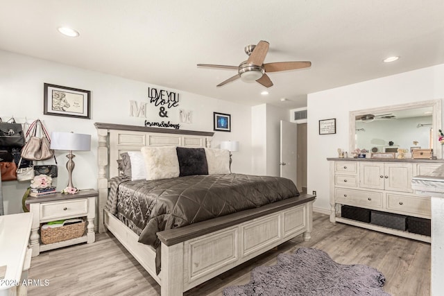 bedroom featuring light wood-style floors, ceiling fan, visible vents, and recessed lighting