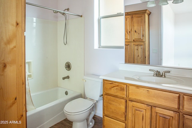 bathroom with toilet, shower / bathtub combination, and vanity