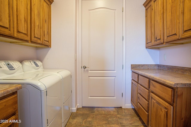 laundry area with cabinet space and washing machine and dryer