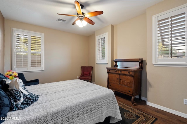 3350 S Holguin Way, Chandler, AZ 85248 - bedroom featuring baseboards, dark wood finished floors, and a ceiling fan