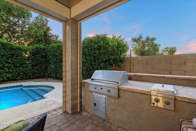 3350 S Holguin Way, Chandler, AZ 85248 - patio terrace at dusk with a fenced backyard and a patio area