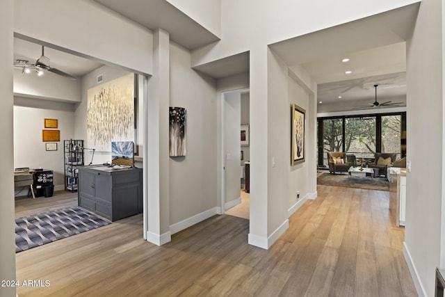 hallway featuring hardwood / wood-style floors