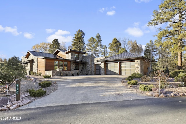 view of front of property with a garage