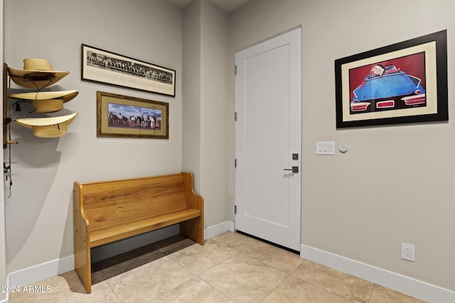 entrance foyer featuring light tile patterned floors