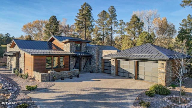 view of front of property featuring a garage