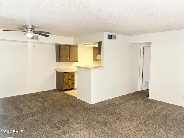 interior space featuring ceiling fan and light carpet