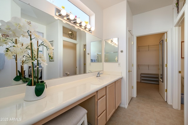 bathroom with vanity and tile patterned floors