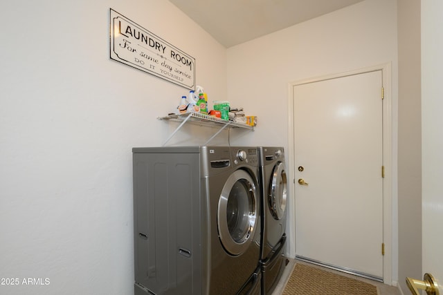 laundry area featuring washing machine and dryer