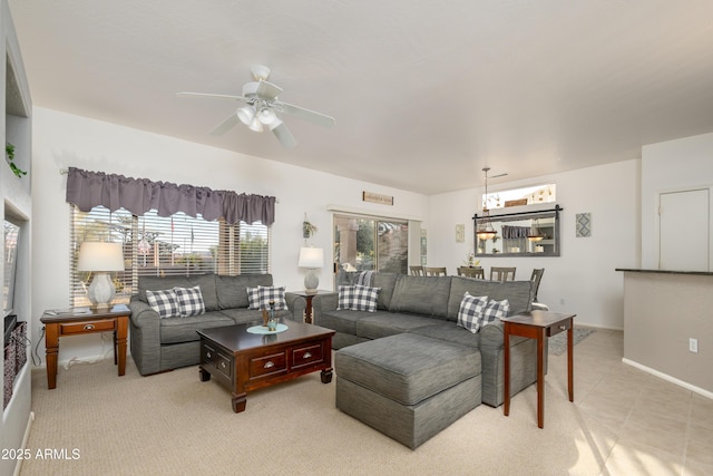 living room featuring ceiling fan