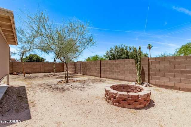 330 S Valley Dr, Apache Junction, AZ 85120 - fenced backyard with a fire pit