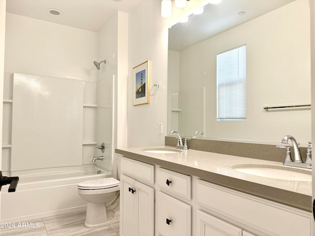 full bathroom with vanity, toilet, and bathtub / shower combination