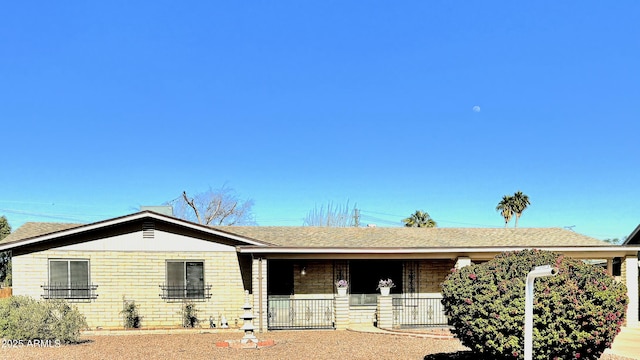 ranch-style house with brick siding