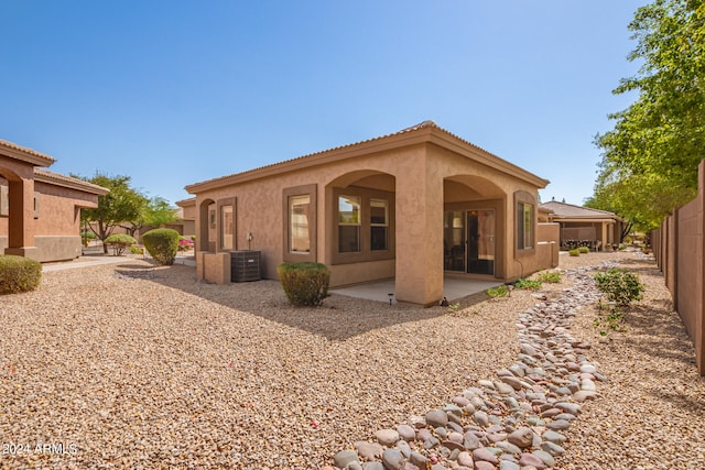 rear view of house featuring a patio area