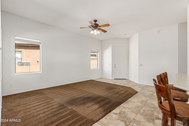 interior space featuring ceiling fan