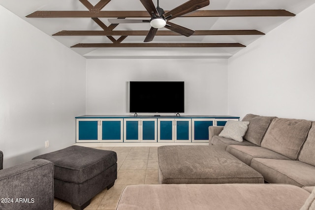 living room with ceiling fan, lofted ceiling with beams, and light tile patterned floors