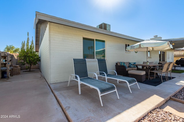 back of house featuring a patio