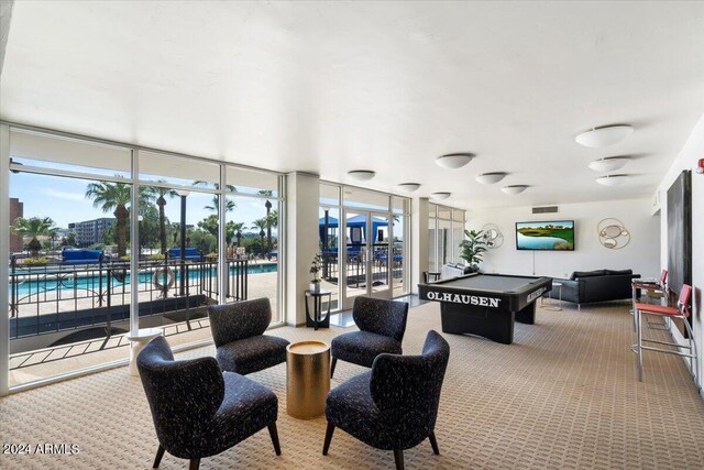 805 N 4th Ave N Unit 902, Phoenix, AZ 85003 - interior space with billiards, floor to ceiling windows, a wealth of natural light, and carpet floors