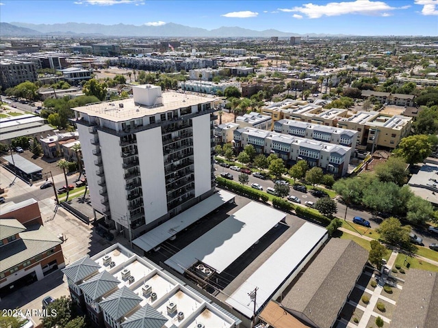 birds eye view of property with a mountain view