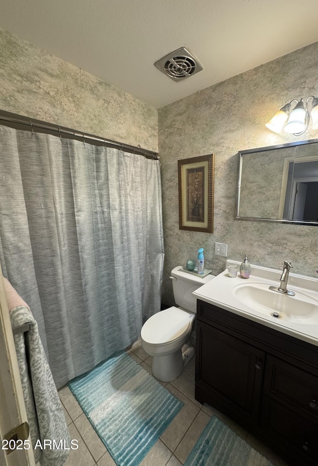 full bathroom with tile patterned flooring, toilet, vanity, visible vents, and a shower with curtain