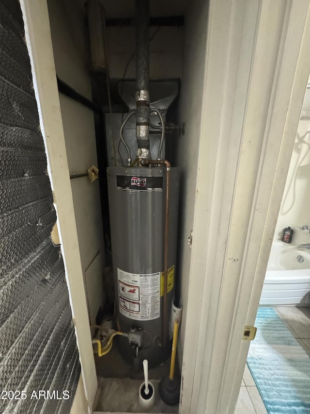 utility room with water heater