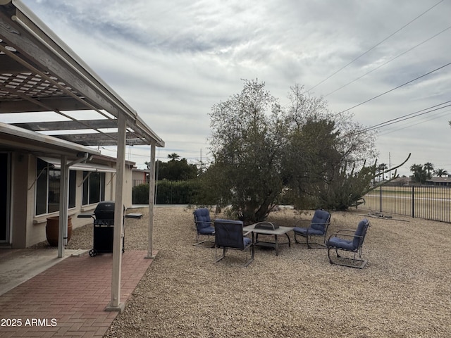 view of yard with a patio area, fence, and a pergola
