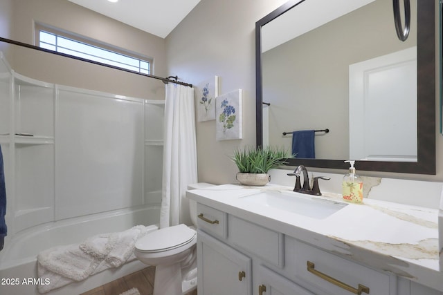 full bathroom featuring vanity, toilet, and shower / bath combo with shower curtain