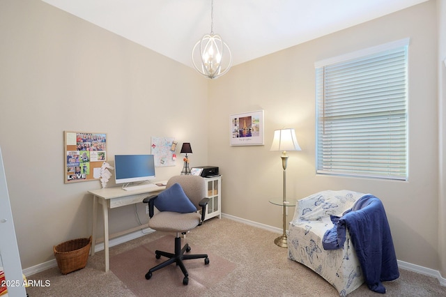 office area with light carpet and an inviting chandelier