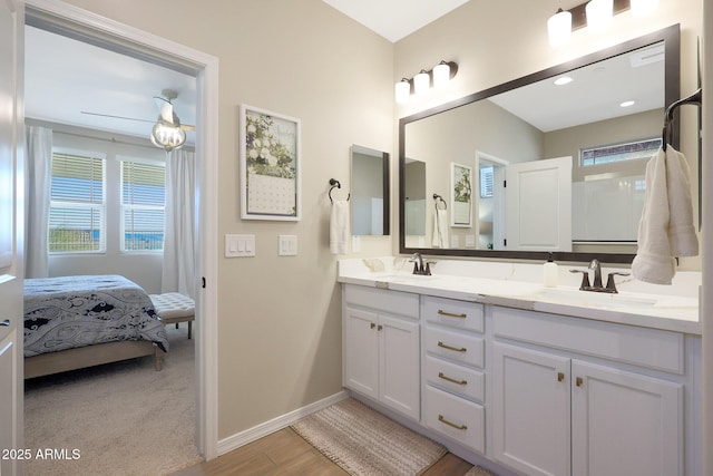 bathroom featuring vanity and wood-type flooring