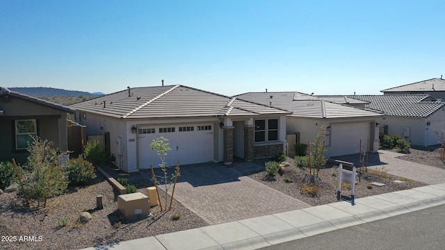 ranch-style home featuring a garage