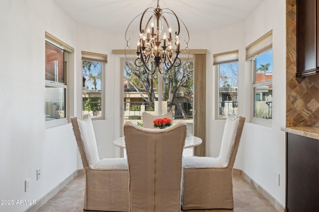 dining room with a chandelier