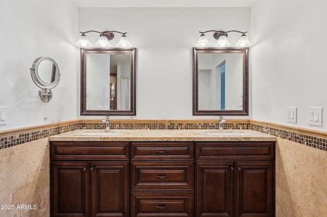 bathroom featuring tile walls and vanity