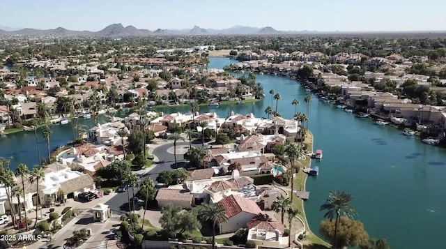 bird's eye view featuring a water and mountain view