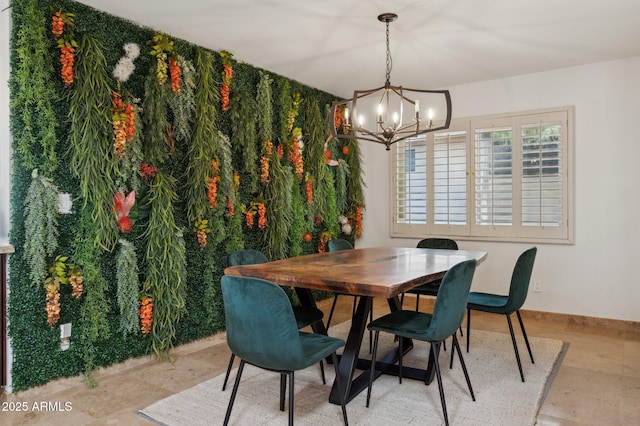 dining space featuring a notable chandelier