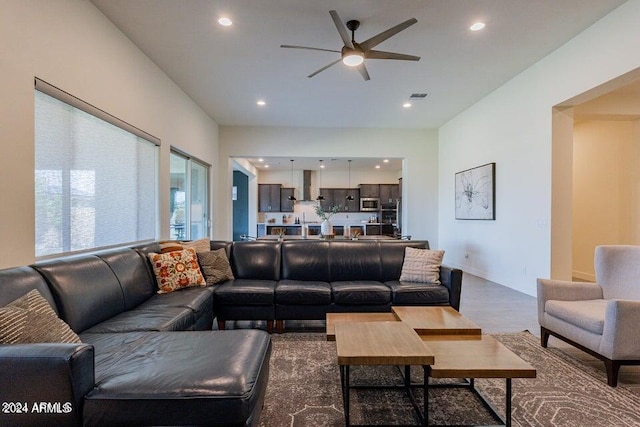 living room with ceiling fan