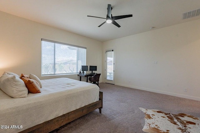 bedroom with ceiling fan, carpet, and access to outside