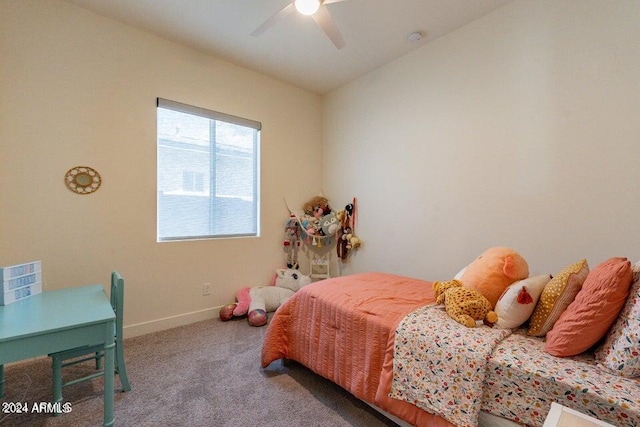 bedroom featuring ceiling fan, vaulted ceiling, and carpet flooring